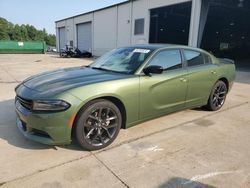 Flood-damaged cars for sale at auction: 2021 Dodge Charger SXT