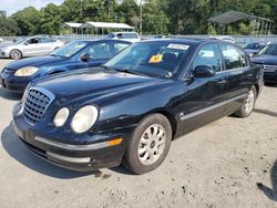 Carros dañados por inundaciones a la venta en subasta: 2004 KIA Amanti