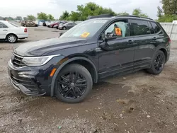 Salvage cars for sale at London, ON auction: 2022 Volkswagen Tiguan SE R-LINE Black