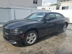 Salvage cars for sale from Copart Opa Locka, FL: 2022 Dodge Charger SXT