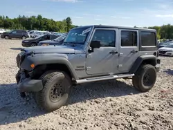 Jeep salvage cars for sale: 2014 Jeep Wrangler Unlimited Sport