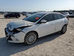 Salvage cars for sale at Houston, TX auction: 2012 Ford Focus SEL