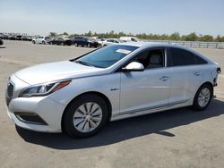 Salvage cars for sale at Fresno, CA auction: 2016 Hyundai Sonata Hybrid