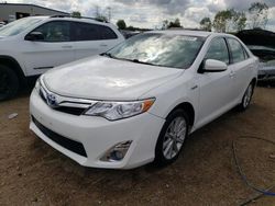 Carros salvage sin ofertas aún a la venta en subasta: 2013 Toyota Camry Hybrid