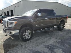 Salvage cars for sale at Jacksonville, FL auction: 2016 Nissan Titan XD SL