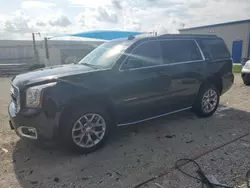 Salvage cars for sale at Arcadia, FL auction: 2015 GMC Yukon SLT