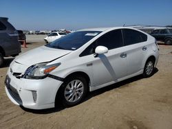 Salvage cars for sale from Copart Cleveland: 2014 Toyota Prius PLUG-IN