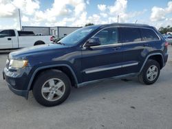 Vehiculos salvage en venta de Copart Orlando, FL: 2012 Jeep Grand Cherokee Laredo