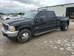 Salvage trucks for sale at Kansas City, KS auction: 2003 Ford F350 Super Duty