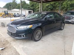 Salvage cars for sale at Hueytown, AL auction: 2014 Ford Fusion Titanium