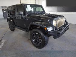 Salvage cars for sale at Farr West, UT auction: 2014 Jeep Wrangler Unlimited Sahara