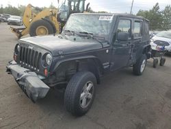 Salvage SUVs for sale at auction: 2010 Jeep Wrangler Unlimited Sport