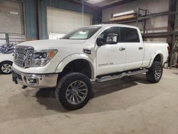 Salvage cars for sale at Eldridge, IA auction: 2016 Nissan Titan XD SL