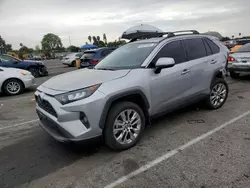 Salvage cars for sale at Van Nuys, CA auction: 2021 Toyota Rav4 XLE Premium