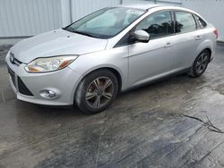 Salvage cars for sale at Opa Locka, FL auction: 2014 Ford Focus SE