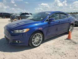 Salvage cars for sale at Houston, TX auction: 2014 Ford Fusion SE Hybrid