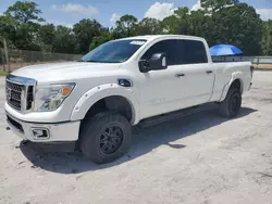 Salvage cars for sale at Fort Pierce, FL auction: 2017 Nissan Titan XD S