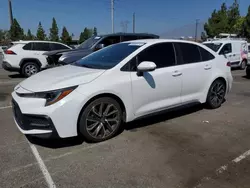 Salvage cars for sale at Rancho Cucamonga, CA auction: 2021 Toyota Corolla SE