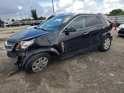 Salvage cars for sale at Miami, FL auction: 2011 Cadillac SRX Luxury Collection