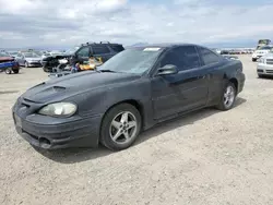 Salvage cars for sale from Copart Helena, MT: 2002 Pontiac Grand AM GT1