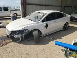 Salvage cars for sale at Houston, TX auction: 2019 Ford Fusion Titanium