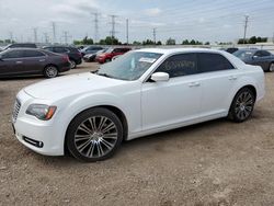 Carros dañados por inundaciones a la venta en subasta: 2013 Chrysler 300 S