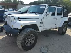 Salvage cars for sale at Seaford, DE auction: 2012 Jeep Wrangler Unlimited Sahara