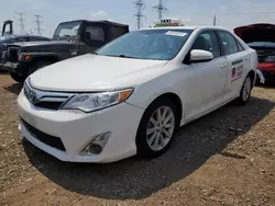 Salvage cars for sale from Copart Elgin, IL: 2014 Toyota Camry Hybrid