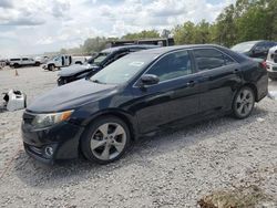 Carros dañados por inundaciones a la venta en subasta: 2014 Toyota Camry L