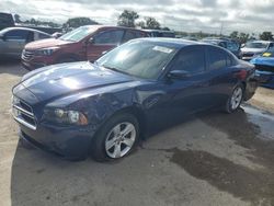 Salvage cars for sale from Copart Riverview, FL: 2014 Dodge Charger SE