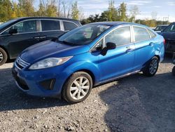 Salvage cars for sale from Copart Leroy, NY: 2011 Ford Fiesta SE