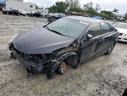 Salvage cars for sale from Copart Opa Locka, FL: 2017 Toyota Camry LE