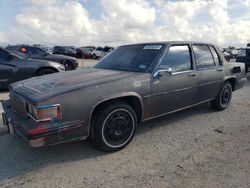 Salvage cars for sale at San Antonio, TX auction: 1985 Cadillac Deville