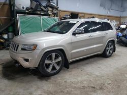 Salvage cars for sale from Copart Kincheloe, MI: 2014 Jeep Grand Cherokee Overland