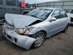 KIA salvage cars for sale: 2004 KIA Spectra LX