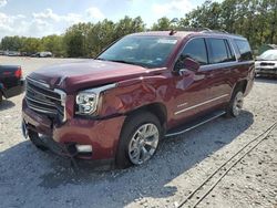 Salvage cars for sale at auction: 2019 GMC Yukon SLT