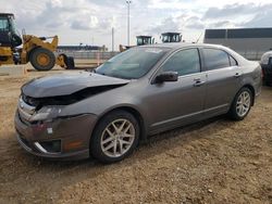 Salvage cars for sale from Copart Nisku, AB: 2010 Ford Fusion SEL