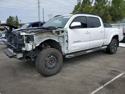 Salvage cars for sale from Copart Rancho Cucamonga, CA: 2018 Toyota Tacoma Double Cab