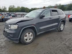 Jeep salvage cars for sale: 2011 Jeep Grand Cherokee Laredo