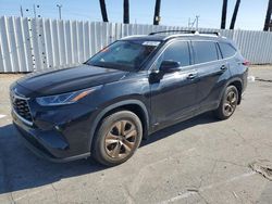 Toyota salvage cars for sale: 2022 Toyota Highlander Hybrid XLE