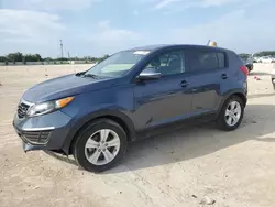 Salvage cars for sale at Arcadia, FL auction: 2013 KIA Sportage Base