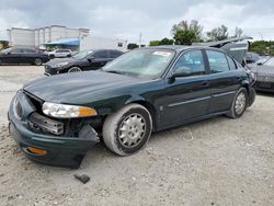 Salvage cars for sale at Opa Locka, FL auction: 2002 Buick Lesabre Custom