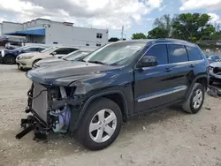 Salvage cars for sale at Opa Locka, FL auction: 2013 Jeep Grand Cherokee Laredo