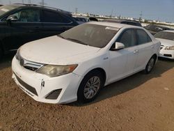 Salvage cars for sale from Copart Elgin, IL: 2012 Toyota Camry Hybrid