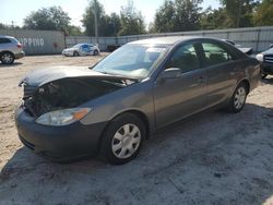 Salvage cars for sale at Midway, FL auction: 2004 Toyota Camry LE