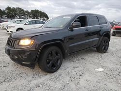 Salvage SUVs for sale at auction: 2015 Jeep Grand Cherokee Laredo