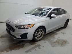 Salvage cars for sale at Houston, TX auction: 2019 Ford Fusion SE