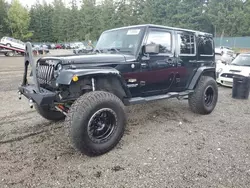 Jeep Wrangler Unlimited Sahara salvage cars for sale: 2014 Jeep Wrangler Unlimited Sahara