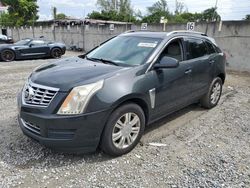 Salvage cars for sale at Opa Locka, FL auction: 2014 Cadillac SRX Luxury Collection