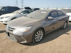 Salvage cars for sale at auction: 2015 Toyota Camry Hybrid